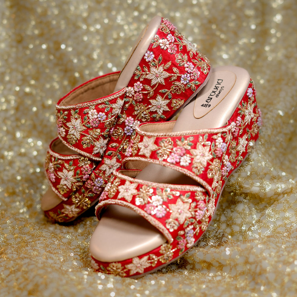 Coral red embroidered wedge sandals with floral beadwork and handcrafted detailing