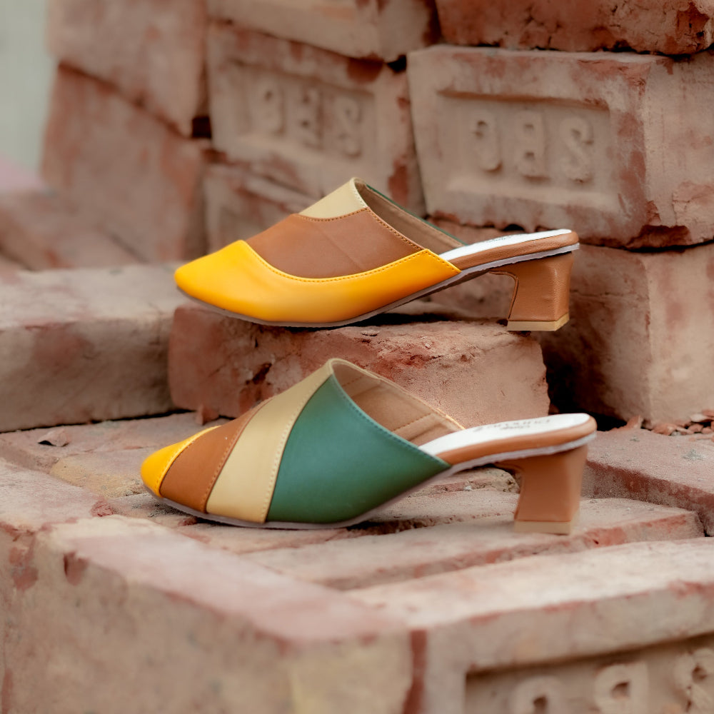 Statement mules with flowing geometric design and comfortable block heel