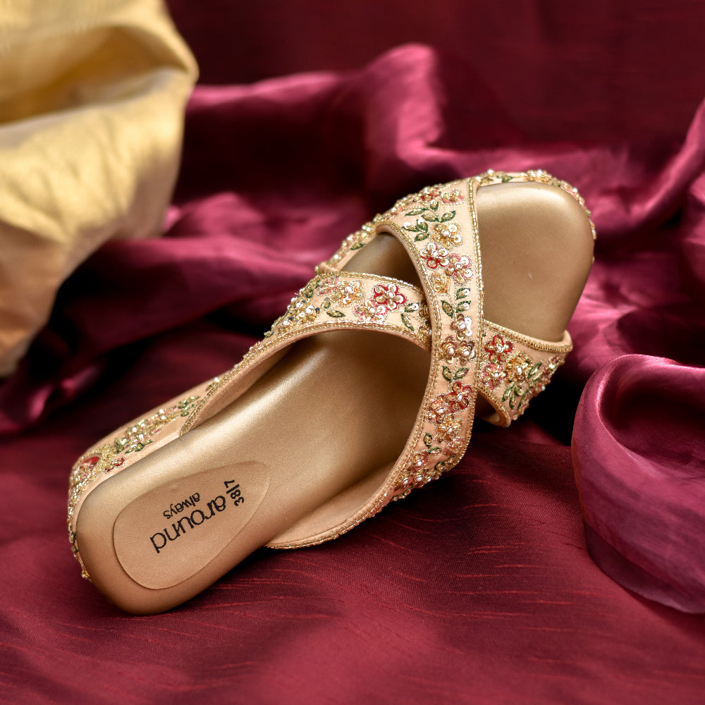 Traditional embroidered platform heels with floral beadwork and open toe cross-strap design