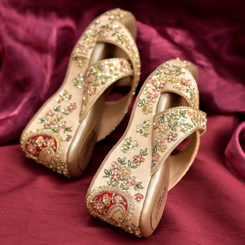 Stylish and versatile Indian wedding heels in golden and beige base with shimmery golden embroidery