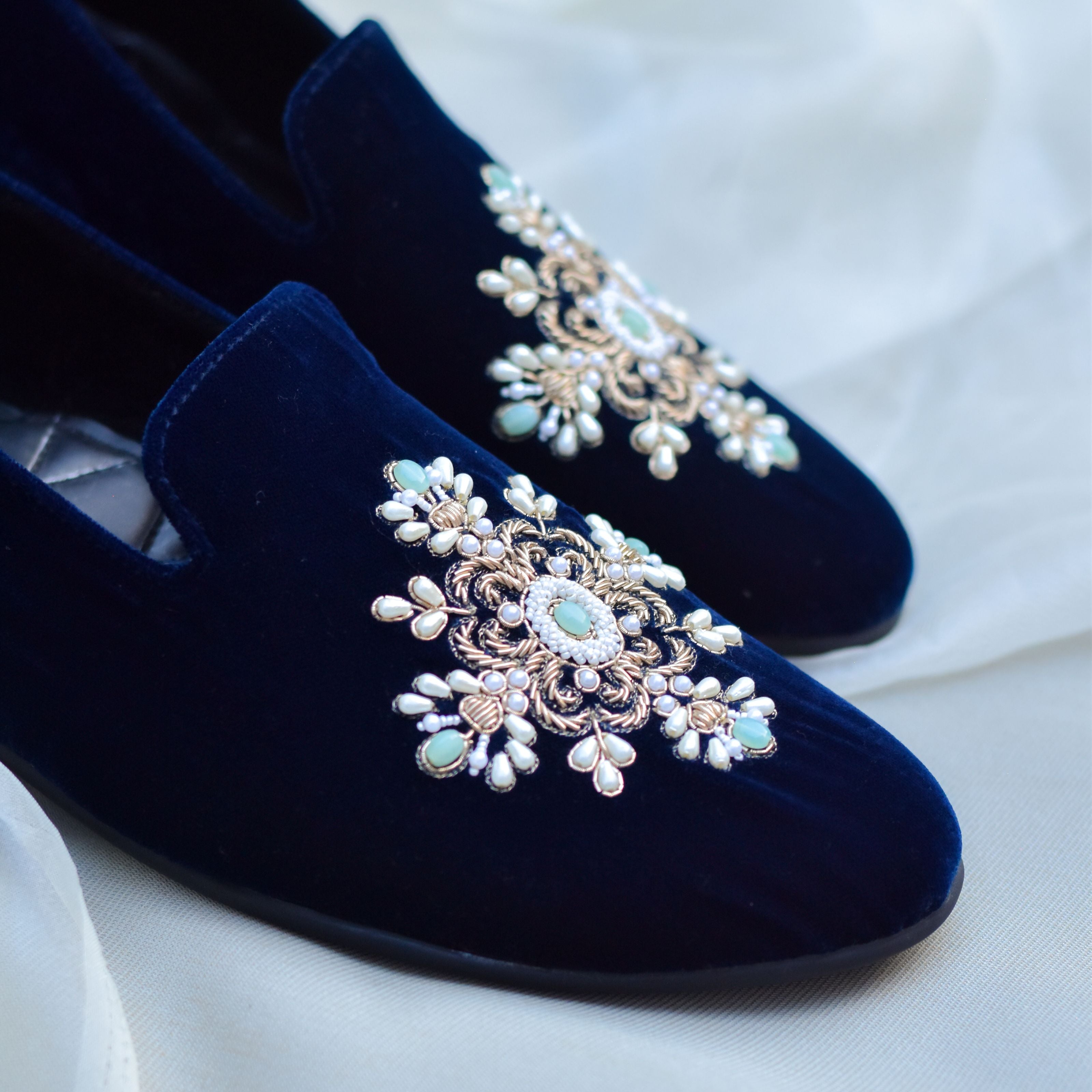 Stylish blue groom loafers featuring ethnic motif in stones and zari making it ideal for weddings, sangeet, and receptions.