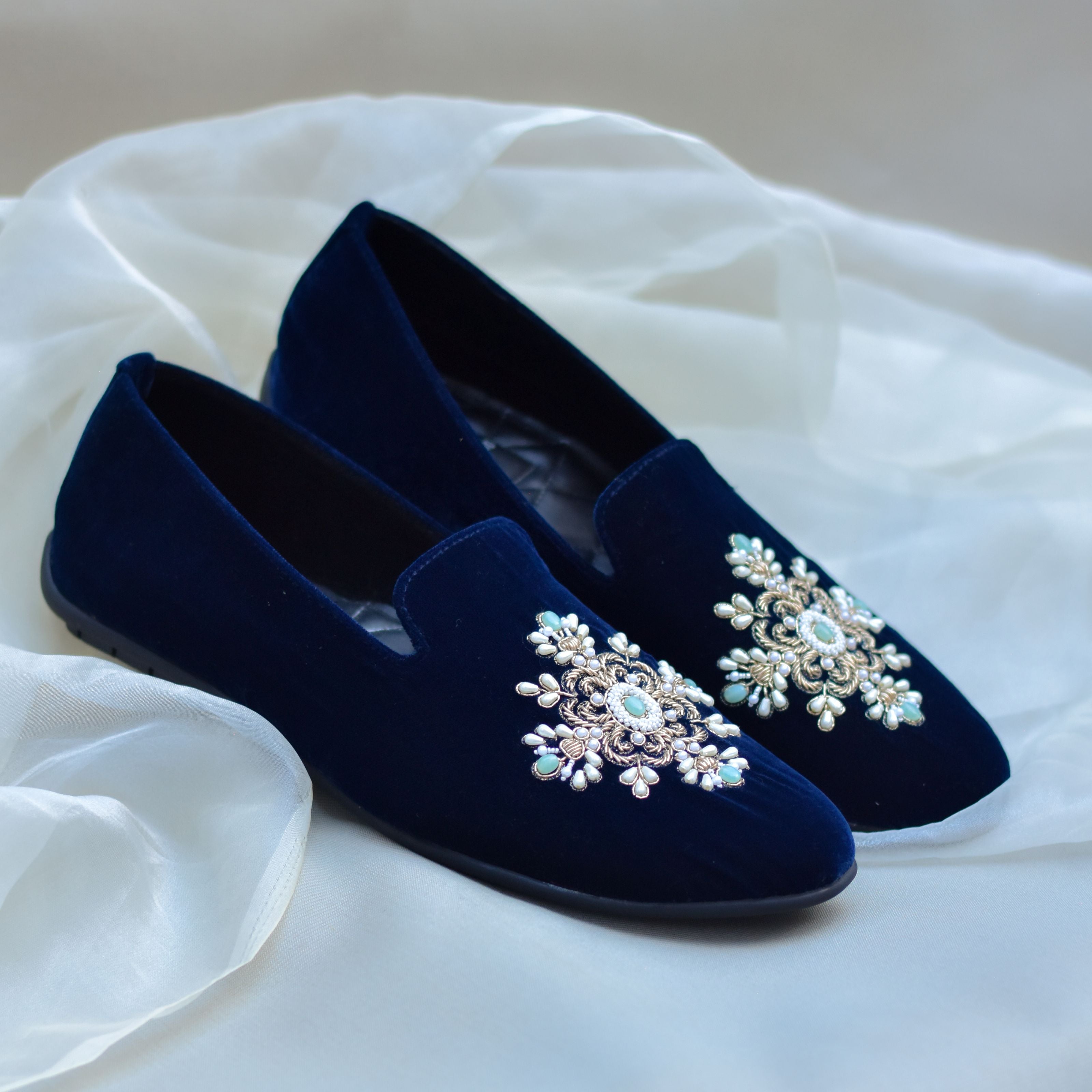 Blue suede ethnic loafers for grooms and guest with embroidery in white stones and golden zari.
