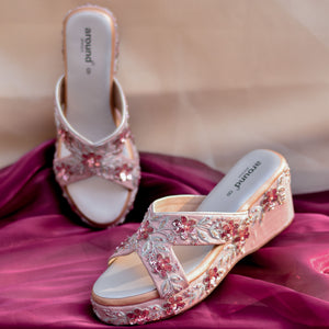 Shimmery pink sequins with silver zardozi on a pastel base.