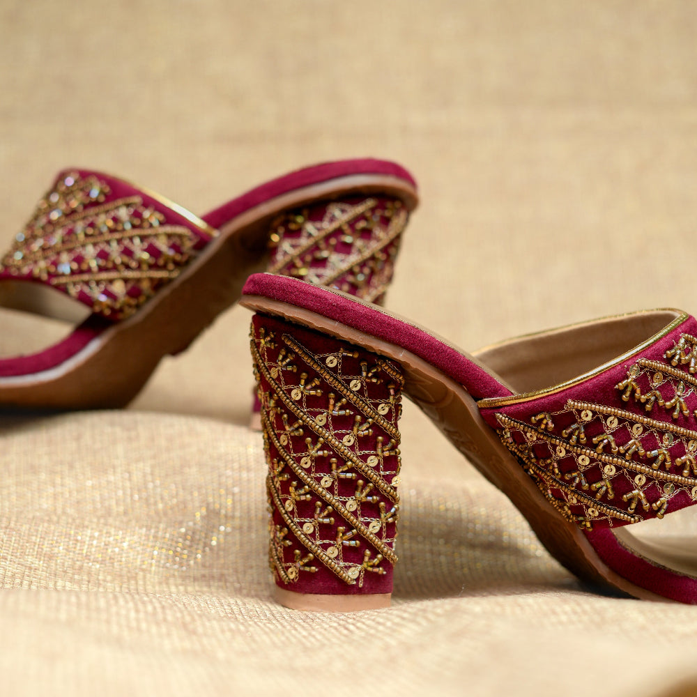 Maroon festive sandals with intricate metallic thread detailing and cushioned footbed
