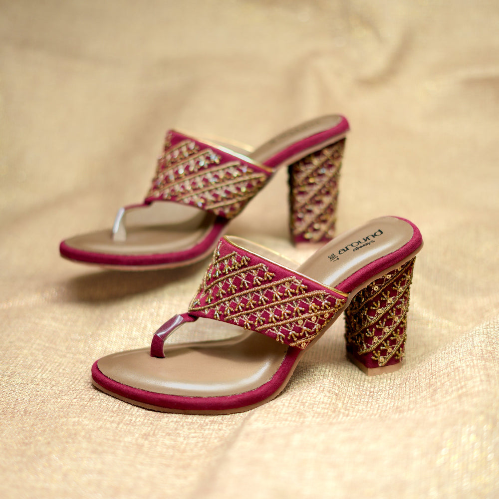 Deep maroon occasion footwear with handcrafted gold patterns and open toe style
