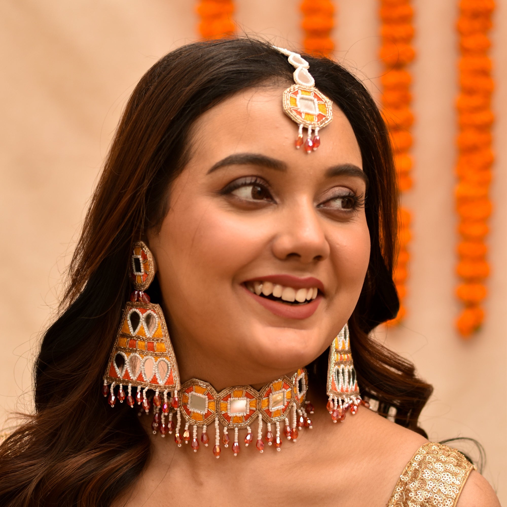 Yellow orange mirror jewellery set for bridal haldi ceremony
