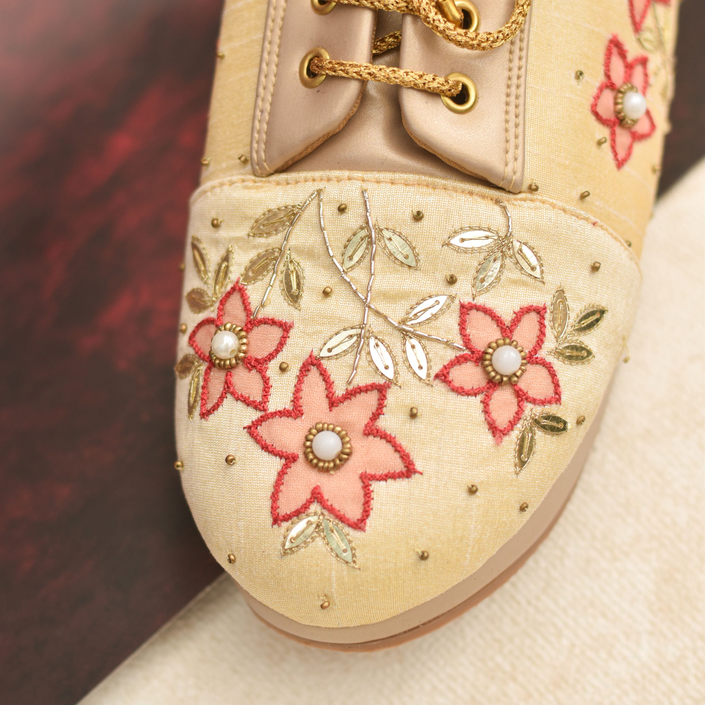Designer floral sneakers for haldi and mehendi celebrations.