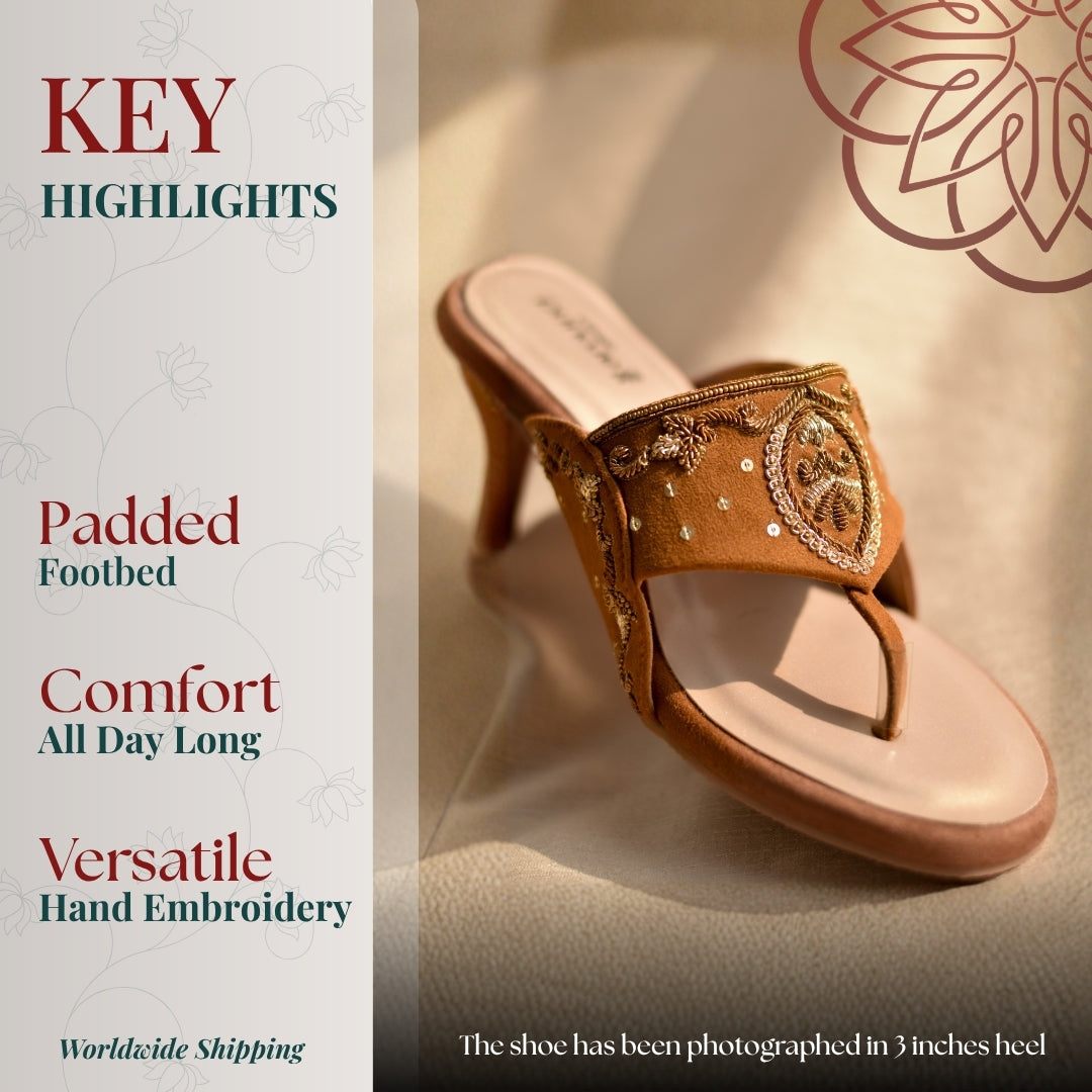 Tan toe ring heel featuring intricate hand embroidery 