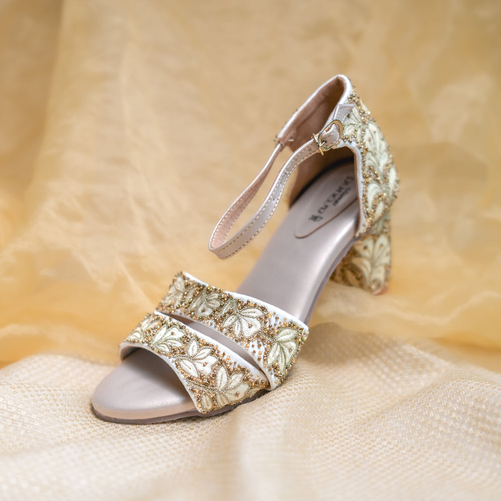 Champagne bridal heels with layered floral front straps

