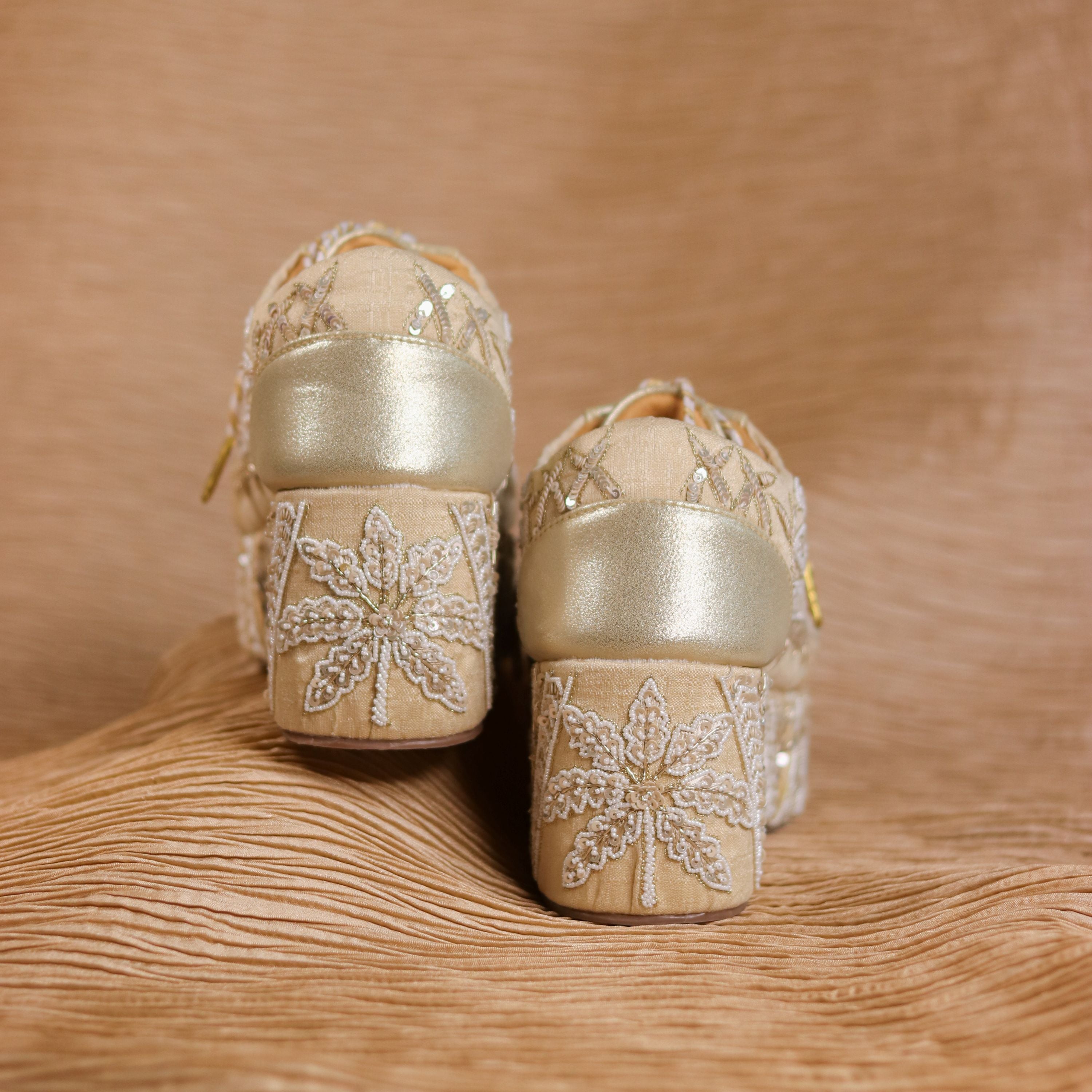 Shimmery sneaker wedges for bride's made with nature inspired pattern in sequins, pearls and threads