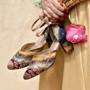 Multicolour brocade ankle-strap heels with maroon, mustard, and blue panels
