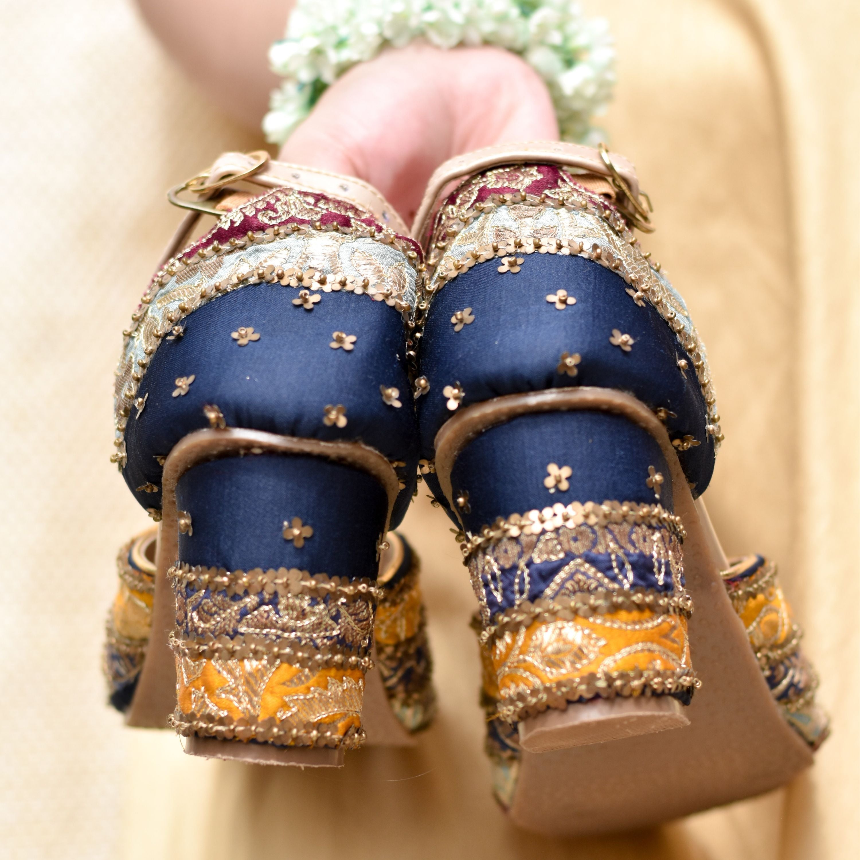 Handmade festive shoes for women with gold embroidered floral detailing