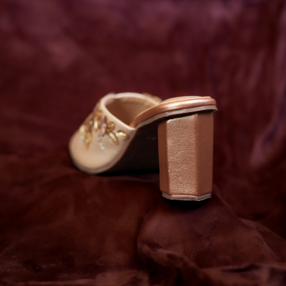 Women’s rose-gold pointed-toe mule with decorative flowers
