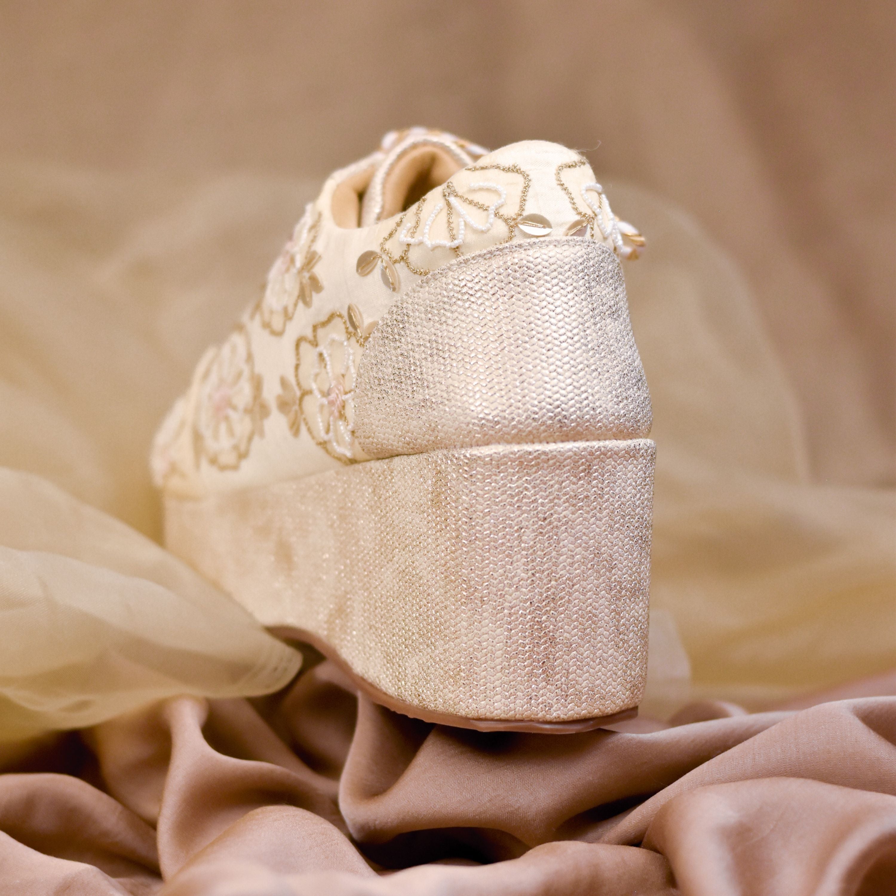 Festive wedding sneakers in ivory with gold embroidery
