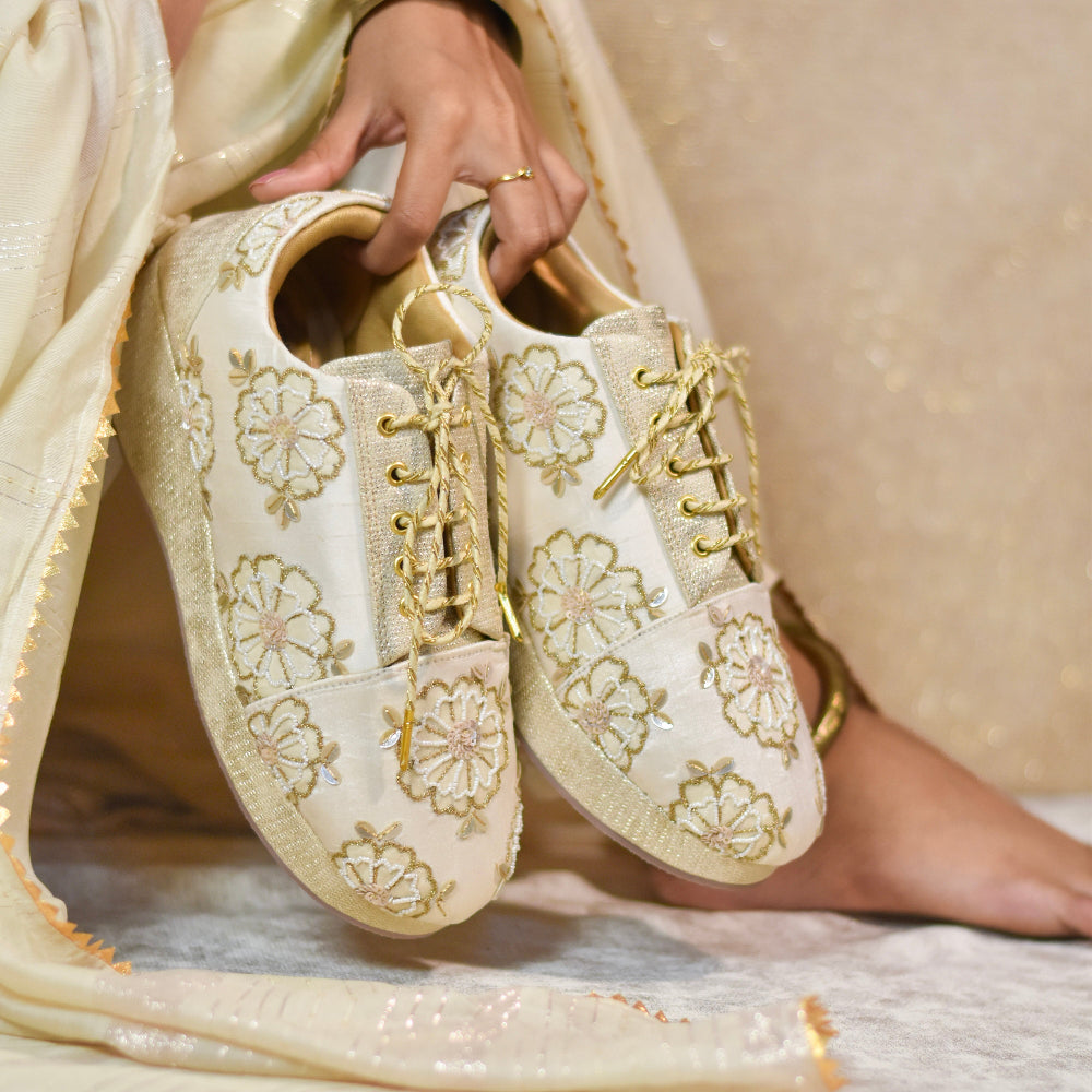 Wedding shoes in golden beige colour tones with minimal floral embroidery for versatility