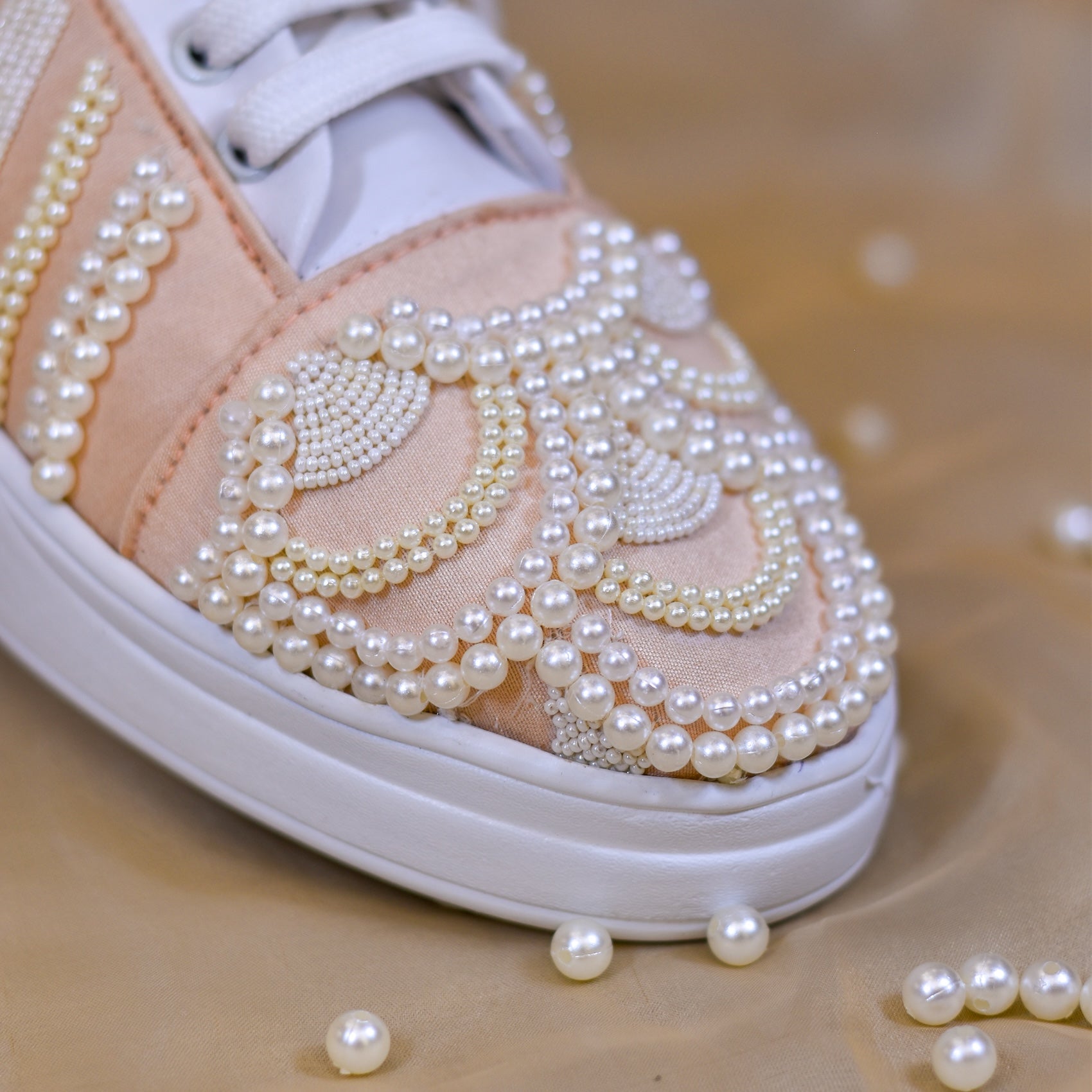 Pastel tone embroidery on wedding sneakers