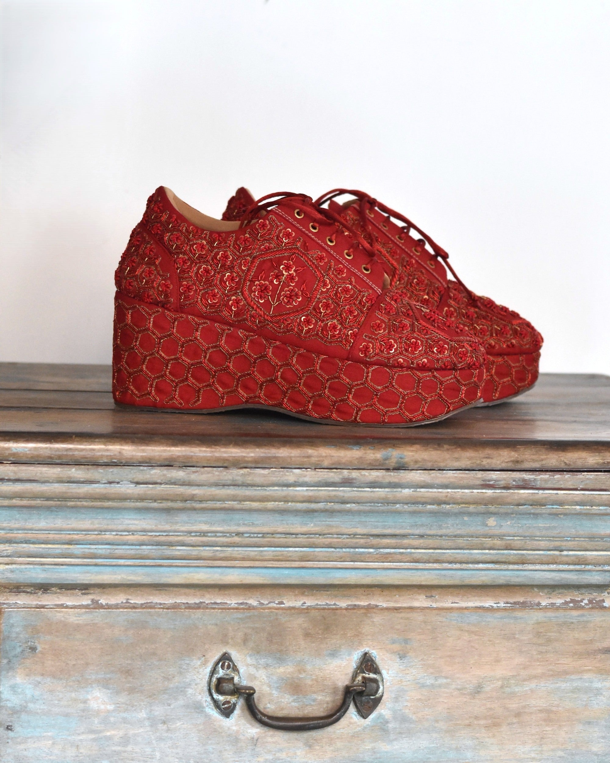 Red lace-up Indian wedding shoe with zardosi embroiery on heels for lehenga