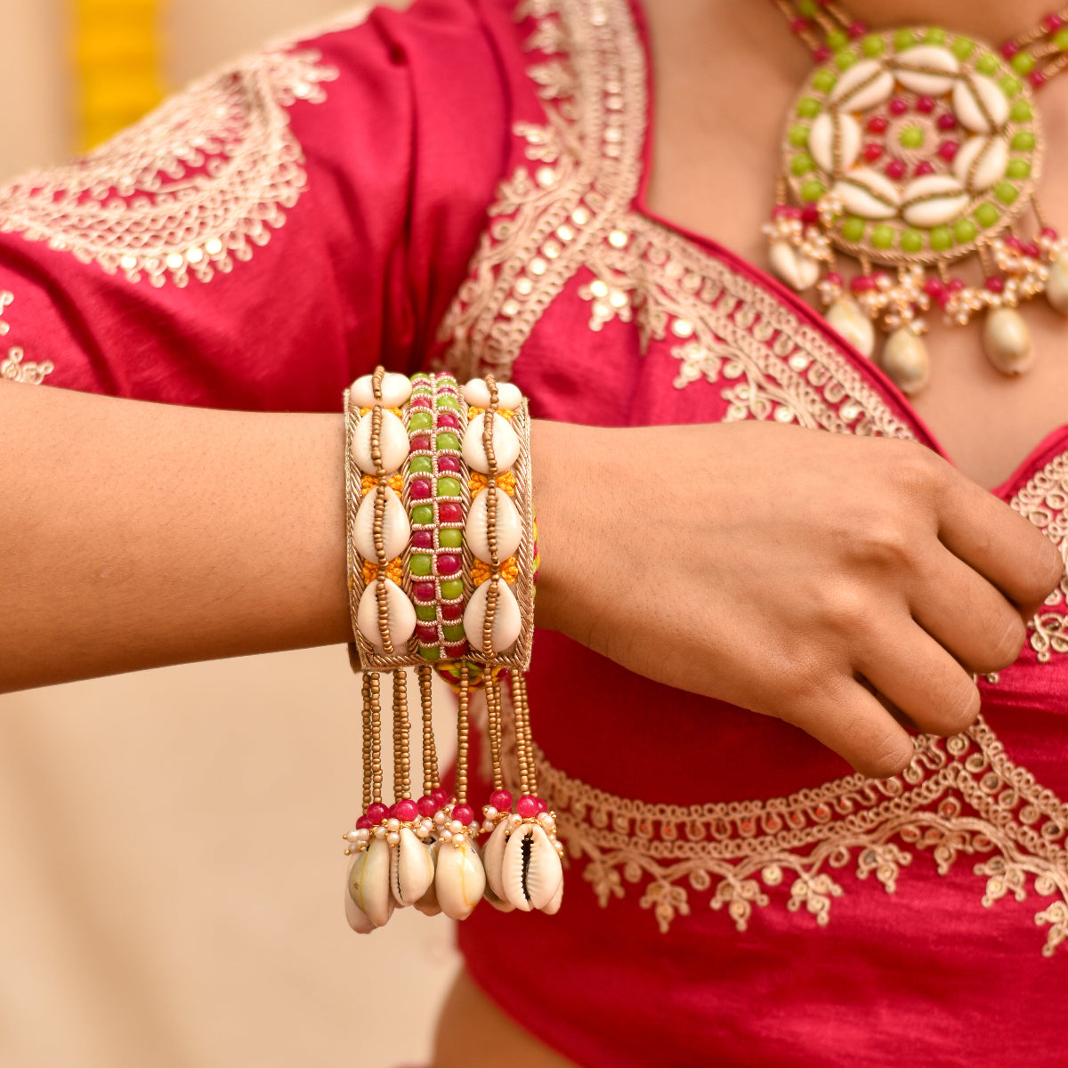 Designer bangle style hathphool with beads and kauri shell hangings for haldi 