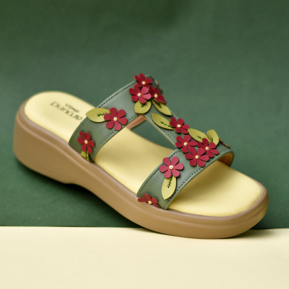 Green casual sandal with three-dimensional floral design and platform sole