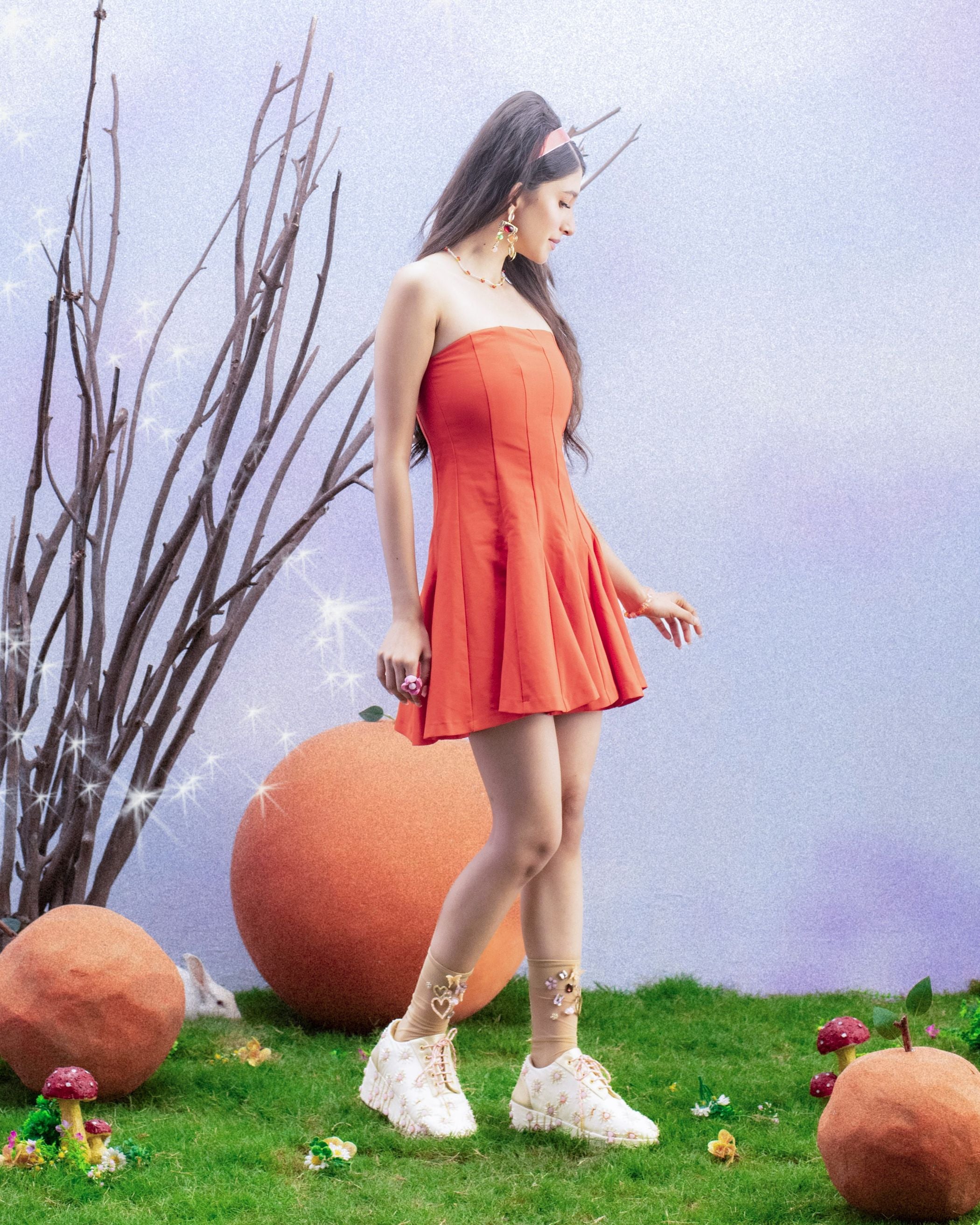 Women wearing statement sneakers with playful embroidered shoes