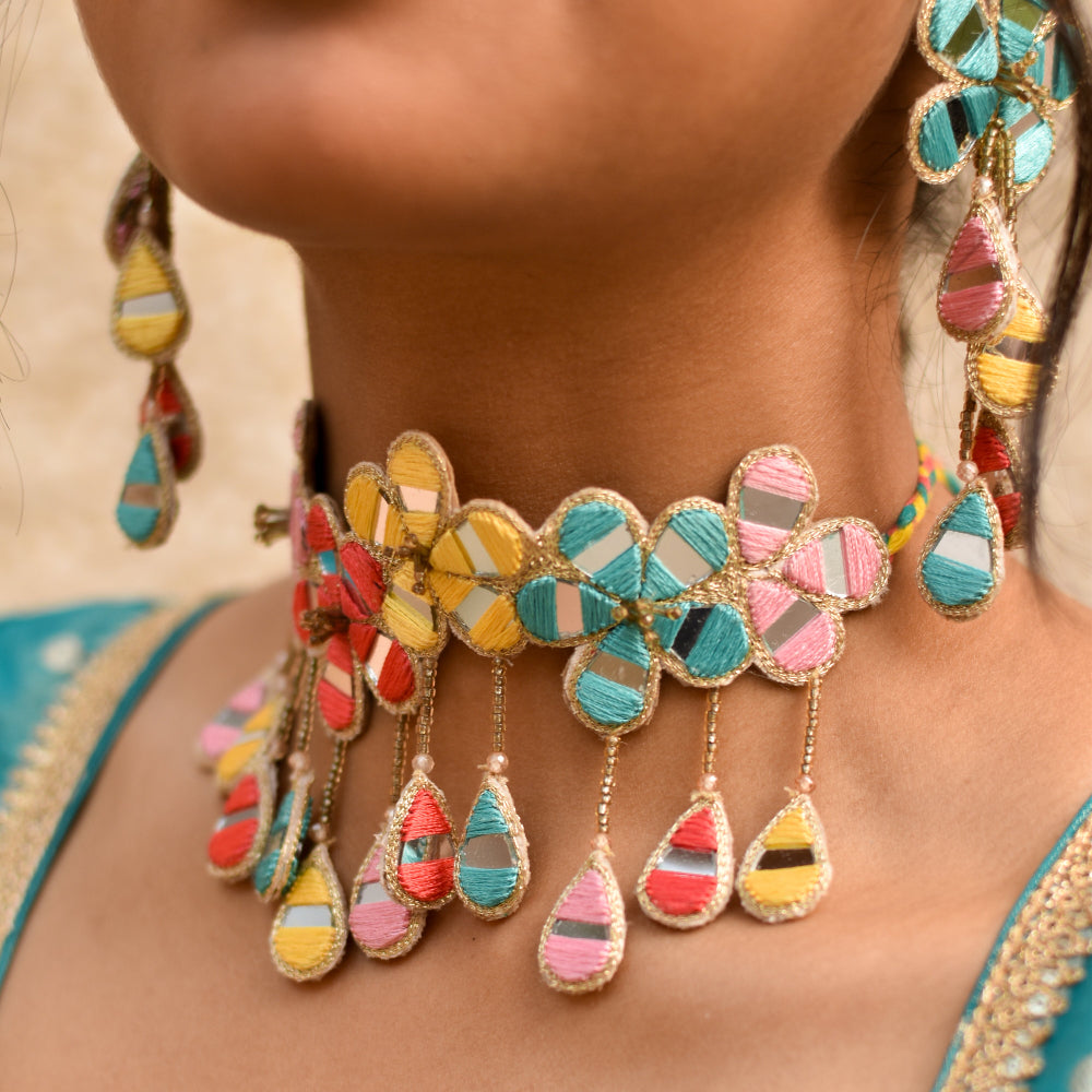 Colorful necklace with hanging pendants for a vibrant bridal haldi look