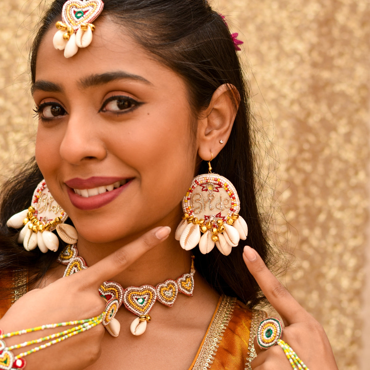 Quirky white beaded earrings for brides to wear during Haldi