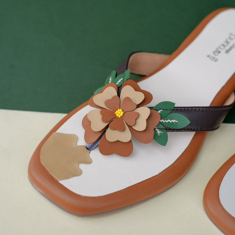 Botanical inspired flat sandals with layered flowers
