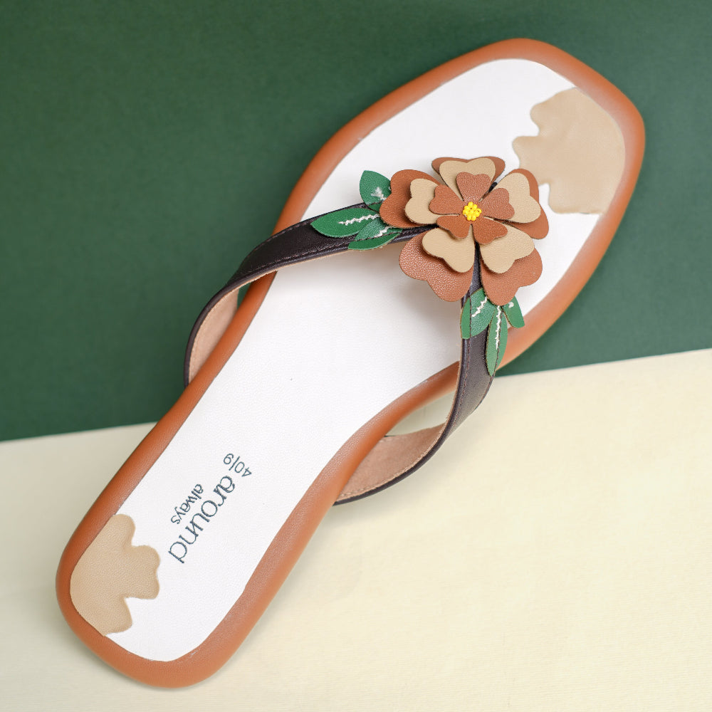 Brown floral flats with green leaf detailing for women
