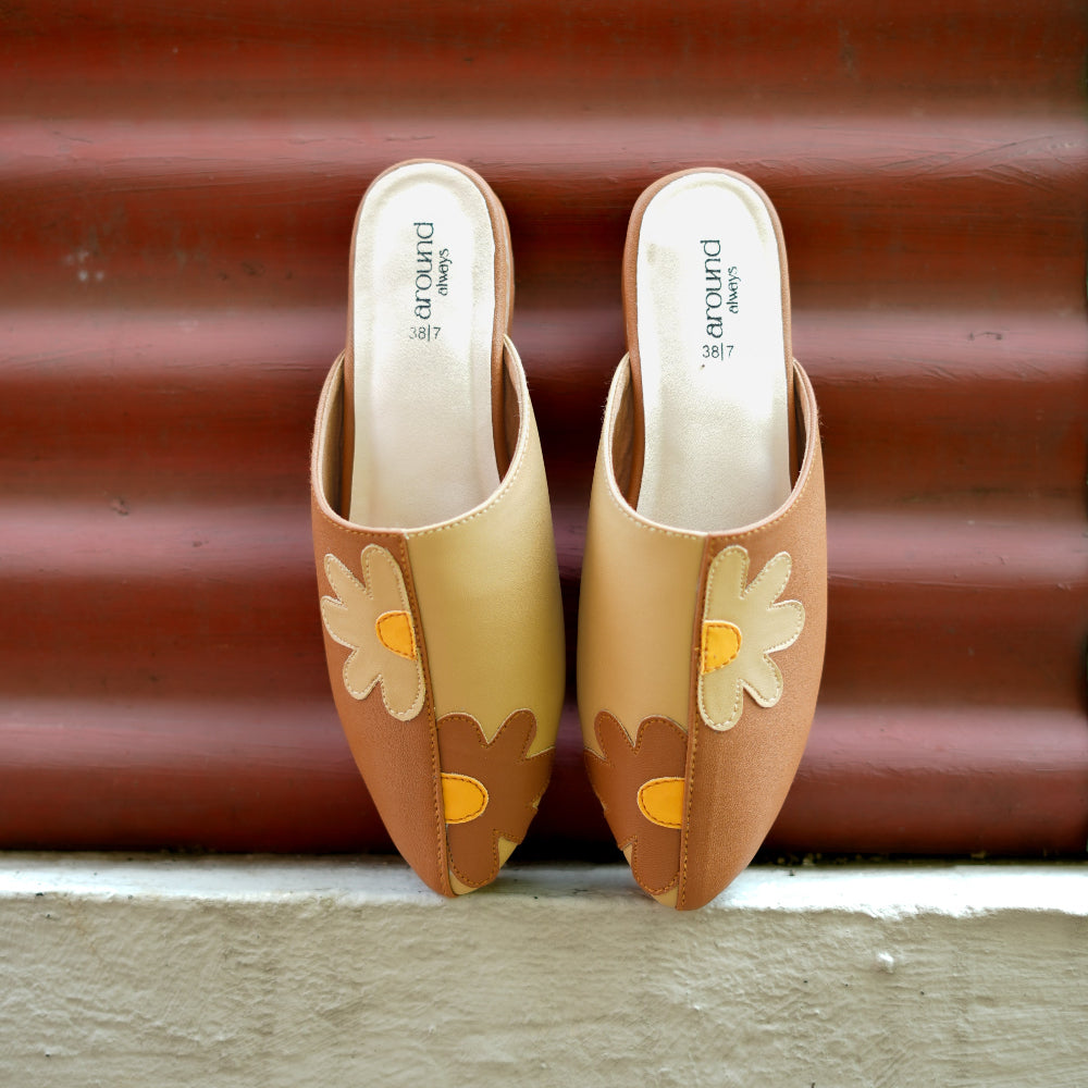 Brown and gold colour-block mule with pointed toe and low heel

