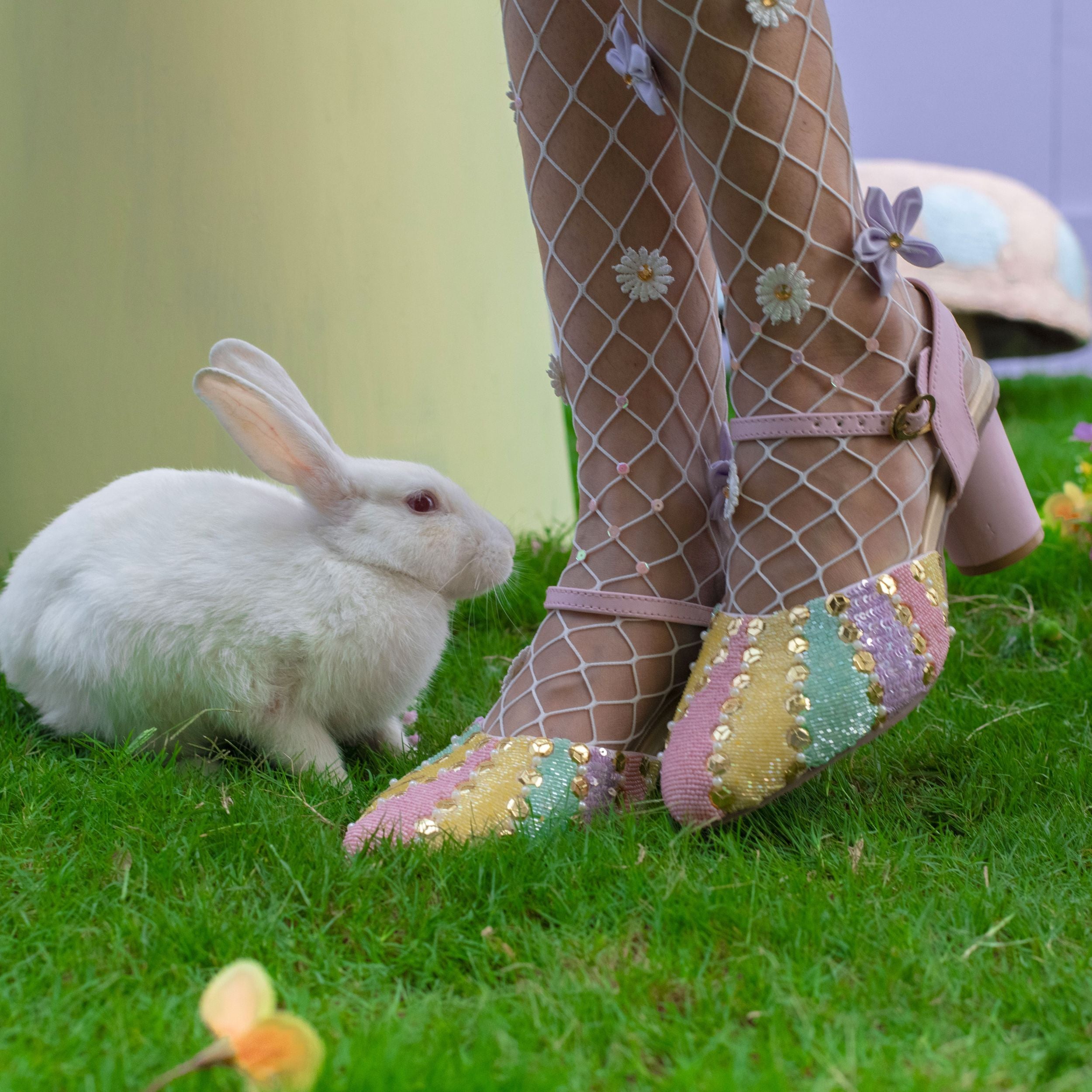 Statement heels with beadwork and soft colour panels along with cushioned footbed