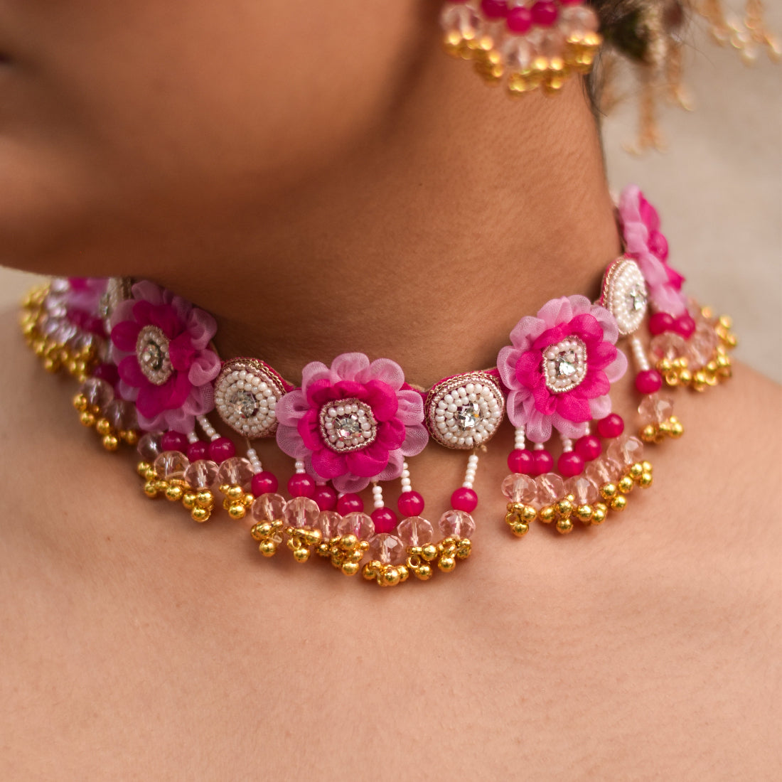 Pink handmade jewellery set for haldi outfits during thematic wedding celebration
