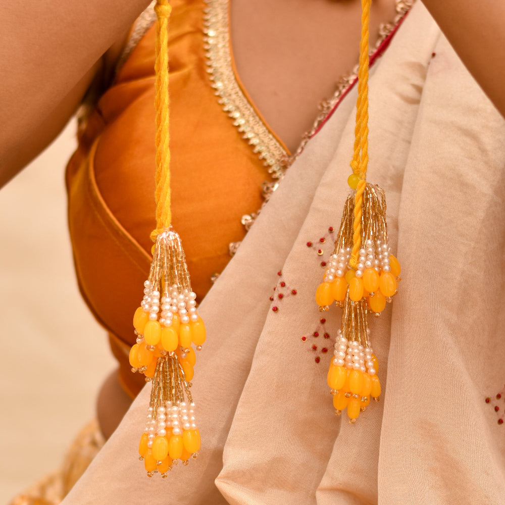 Yellow beaded latkan in hathphool of a handmade haldi jewellery set