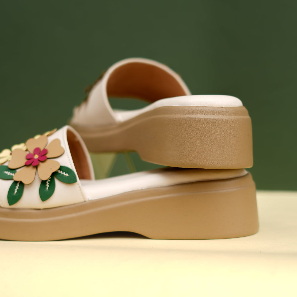 Colourful floral appliqué sandal with ivory base and platform sole