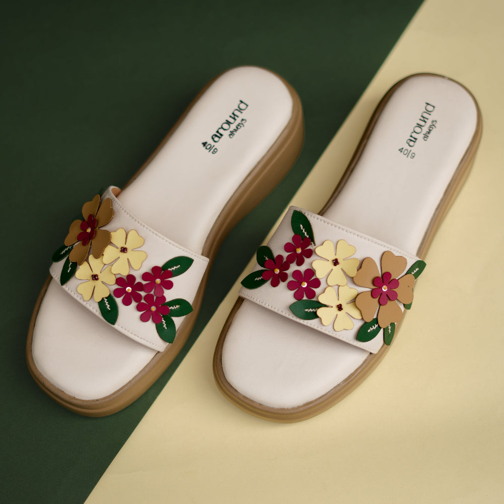 Ivory platform sandal with berry, cream and tan floral appliqués
