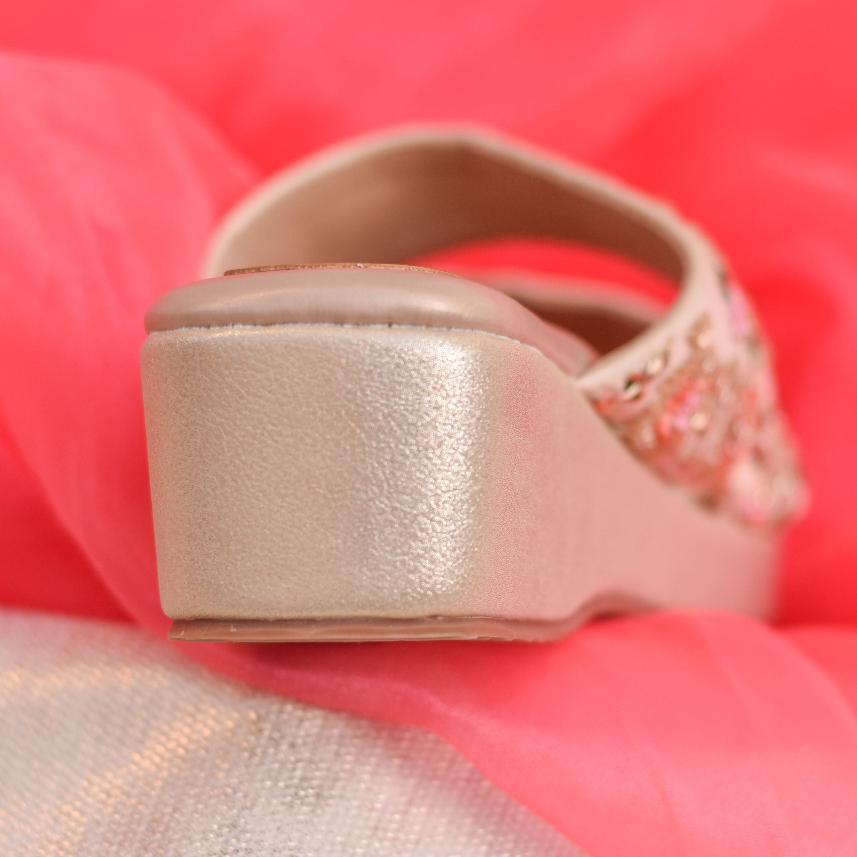 Gold sandal with decorative strap and anti-slip sole