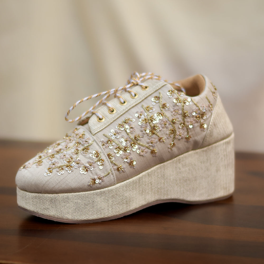 Lace-up wedge shoe with beadwork and textured heel