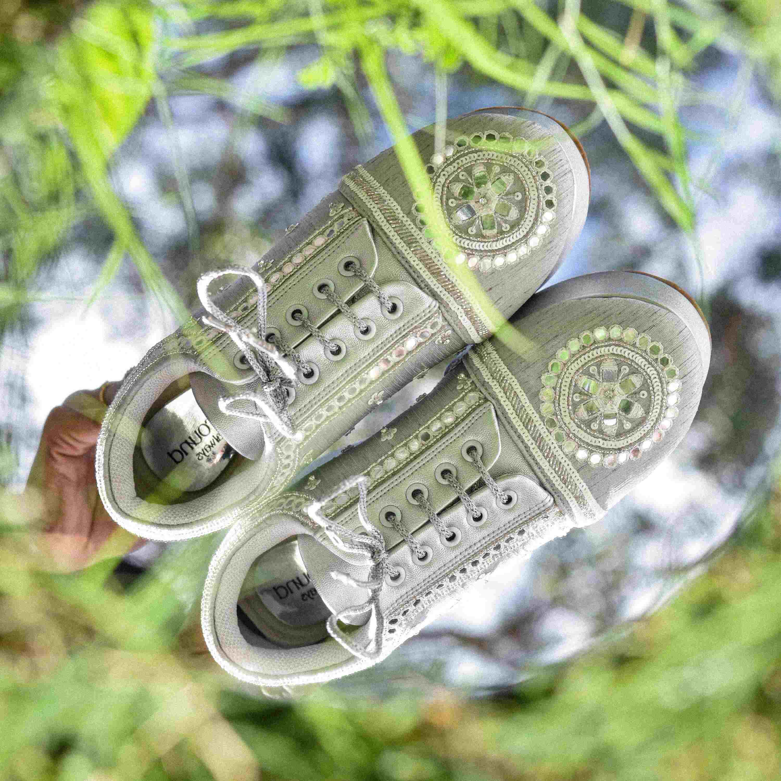 Statement platform sneaker in silver with cushioned sole.