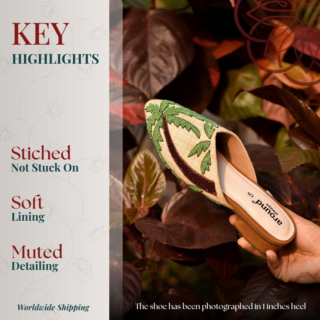Neutral mules with green palm tree beadwork design