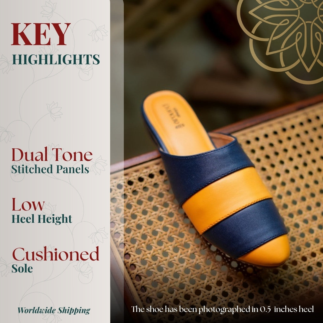 Cruise Mules key highlights: dual tone stitched panels, low heel and cushioned sole, shown in a 0.5 inch heel