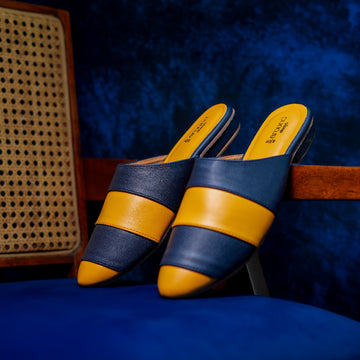 Modern navy mule with contrasting mustard accents and comfortable low heel