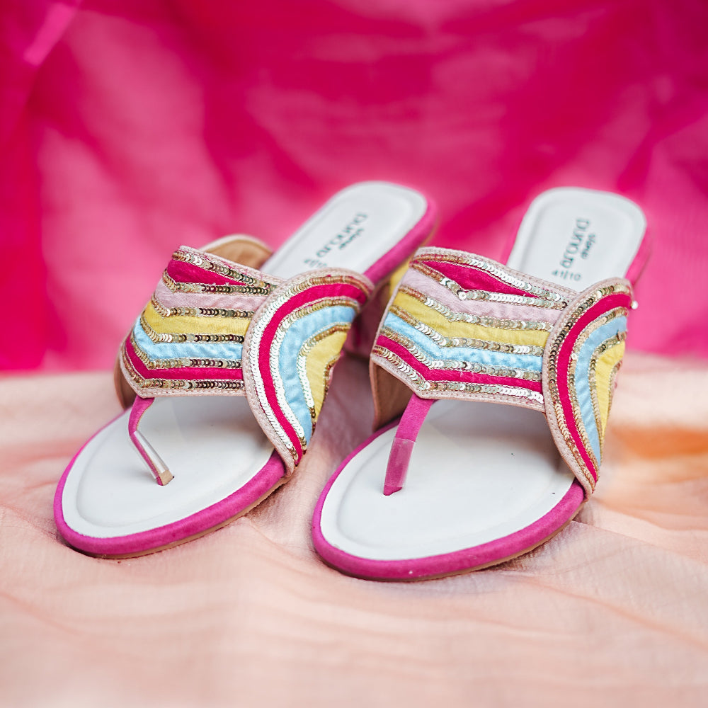Festive block heel sandals featuring vibrant striped embroidery and shimmering sequin detailing