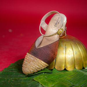 Brown and antique gold slingback heel with textured golden toe
