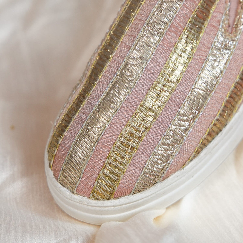 Blush pink wedding sneaker with gold and silver woven detailing
