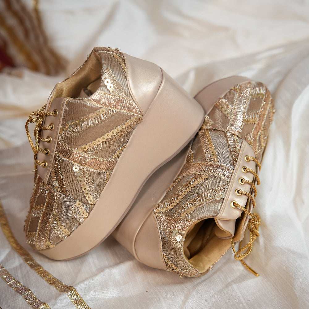 Champagne gold sneaker wedge with gold textile and sequin detailing
