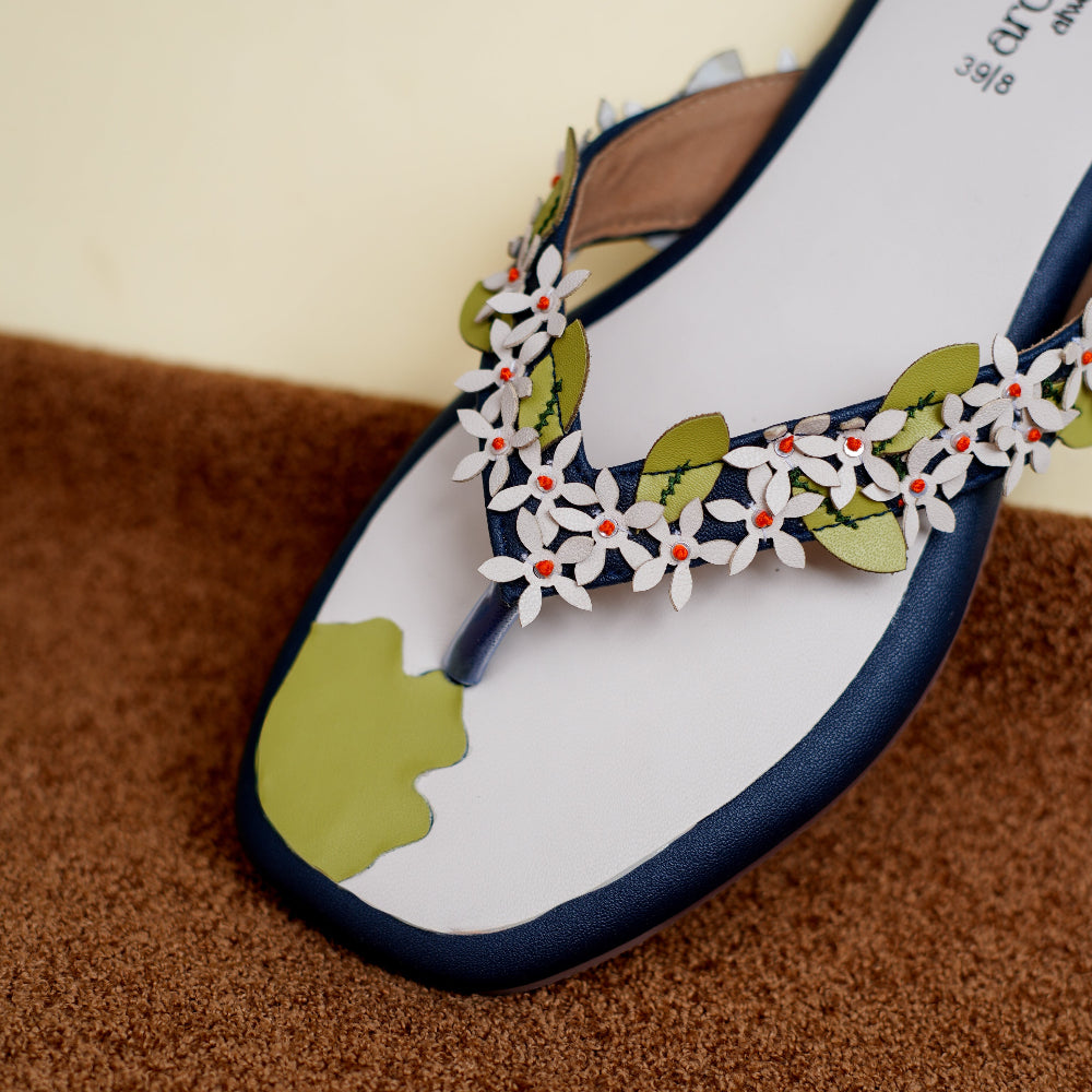 Floral navy sandal with colourful detailing across the front straps

