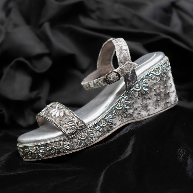 Silver embellished sandals with floral detailing on velvet base with ankle strap
