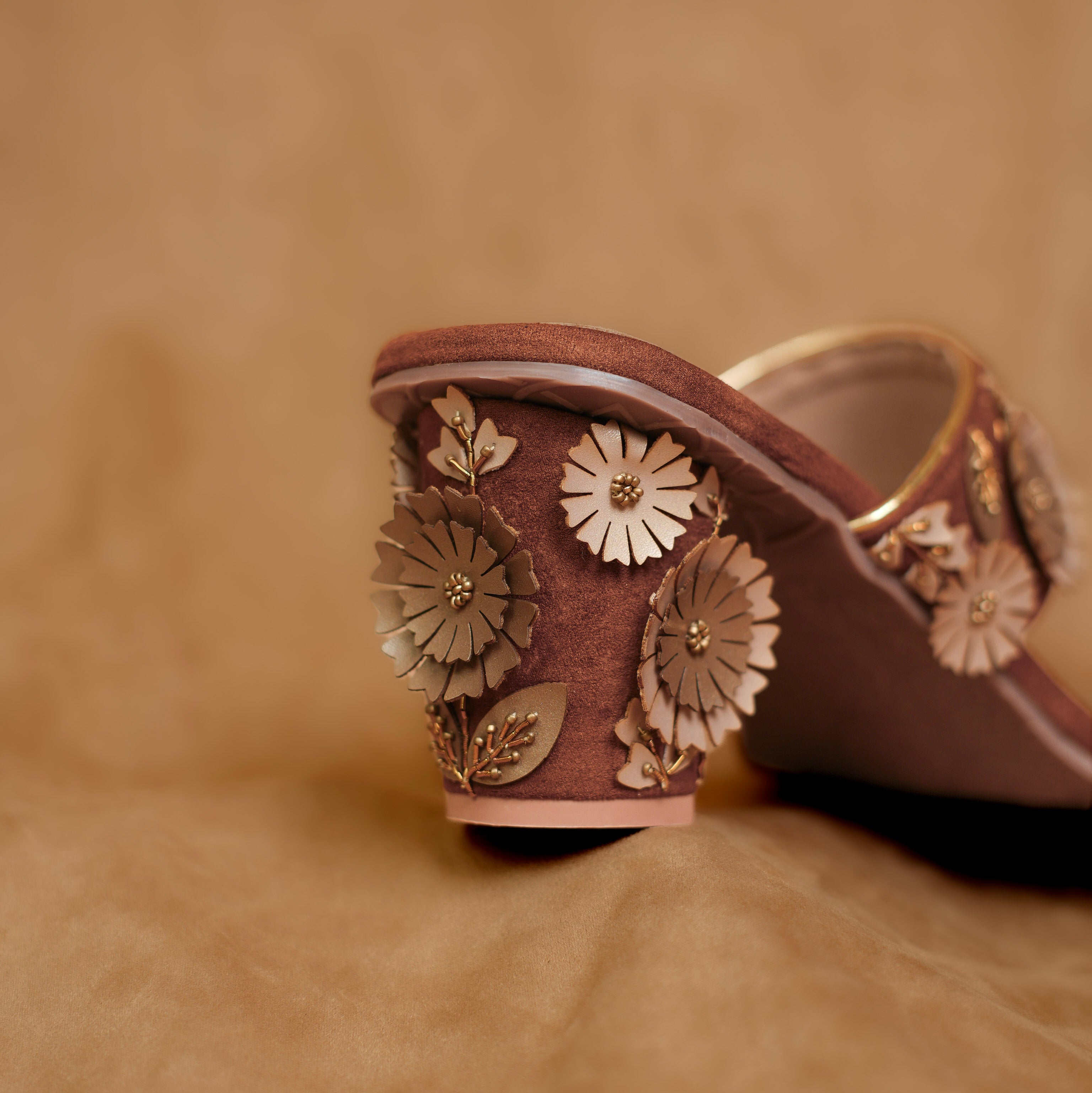 Brown floral sandal with block heel and beige footbed