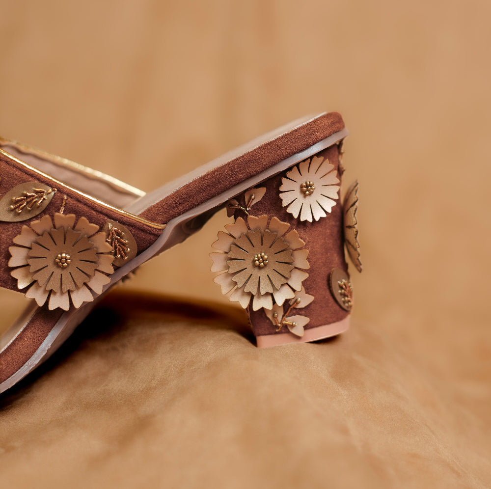 Traditional style women’s sandal with 3D floral embellishments
