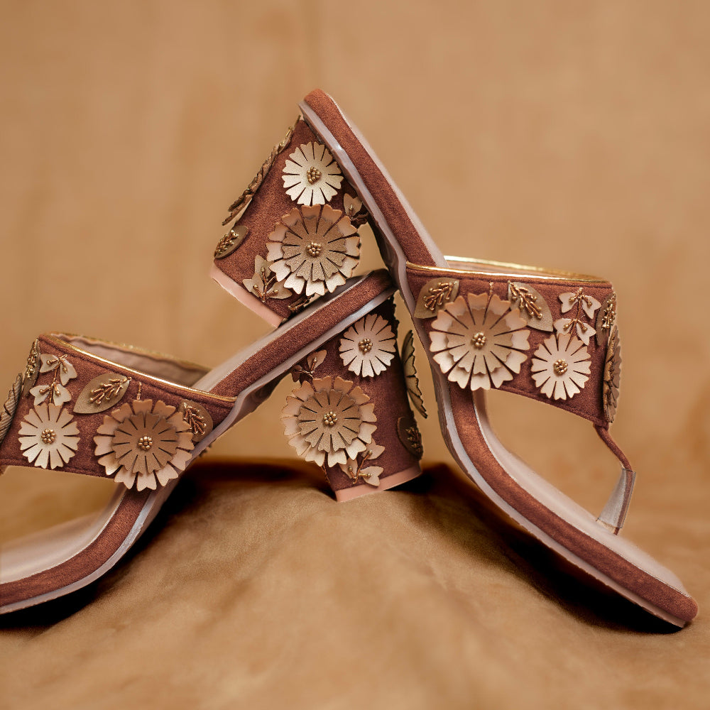 Brown toe-post sandal with floral appliqué detailing

