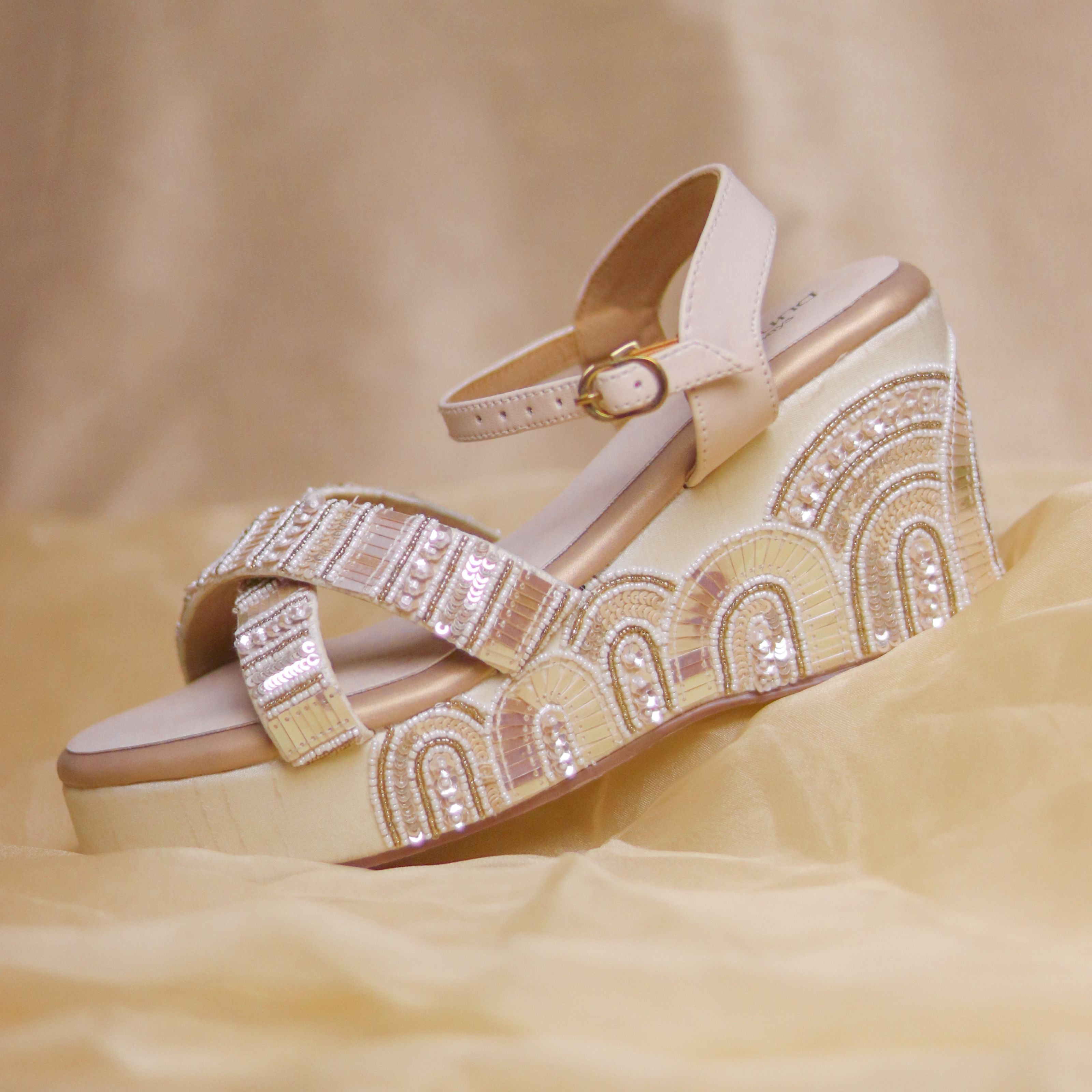 Designer wedge heels for brides with door inspired motifs